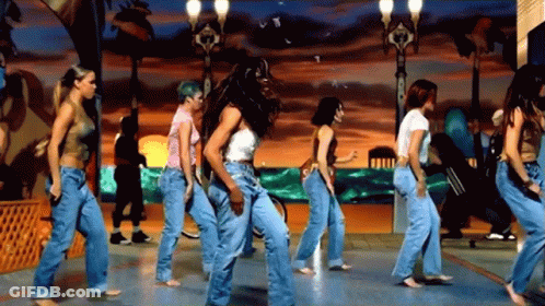 Women Dancing On Street In Jeans GIF