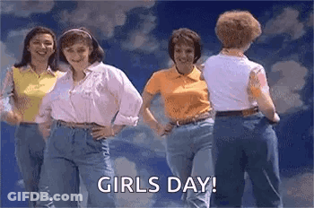 Women Dancing Under Cloudy Sky GIF