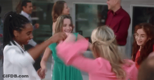Women Dancing While Man Watches GIF