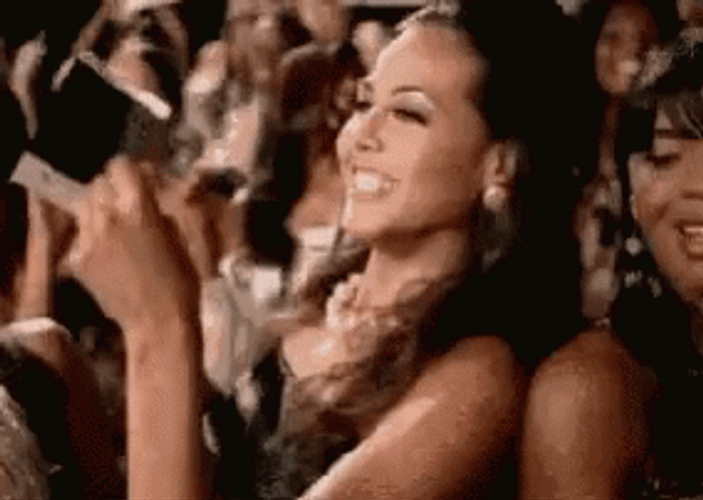 Women Dancing With Polaroid Photos GIF