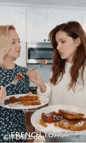 Women Eating French Toast In Kitchen GIF
