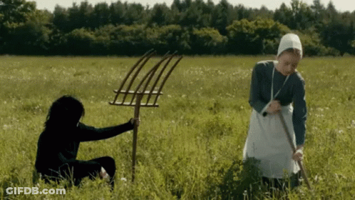 Women Holding Pitchforks GIF