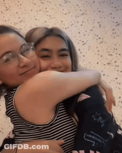 Women Hug Kissing GIF