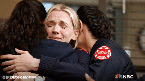 Women Hugging With Chicago Fire Department Patch GIF