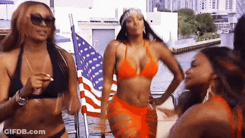 Women In Bikinis Dancing On Boat GIF