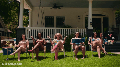 Women In Bikinis Sitting In Chairs GIF