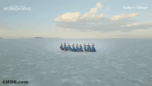 Women In Blue Dresses Holding Hands The Secret Lives Of Mormon Wives GIF
