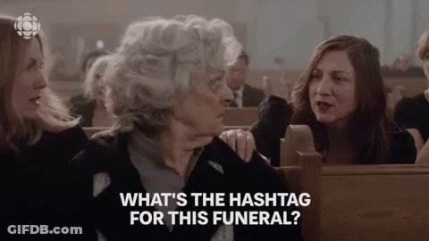 Women In Church Saying What's The Hashtag For This Funeral GIF