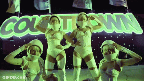 Women In Front Of Countdown Sign GIF