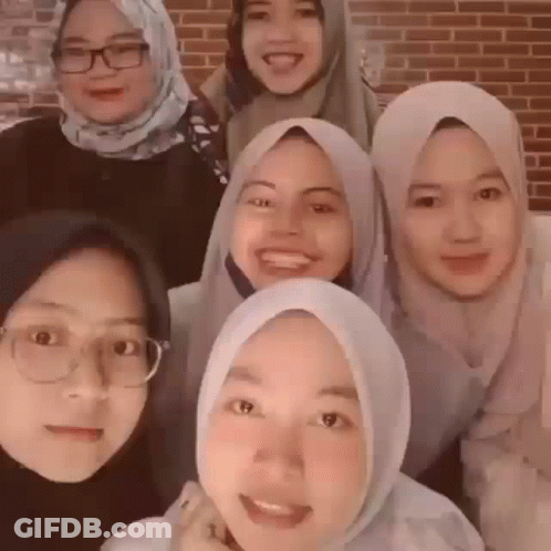 Women In Hijabs Posing GIF