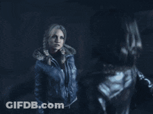 Women In Pink And Black Dresses Eye Contact GIF