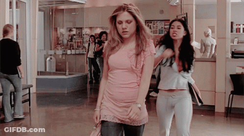 Women In Pink And Blue Shirts GIF