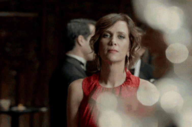 Women In Red Blowing Kisses GIF