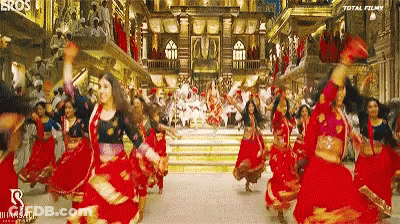 Women In Red Dresses Dancing GIF