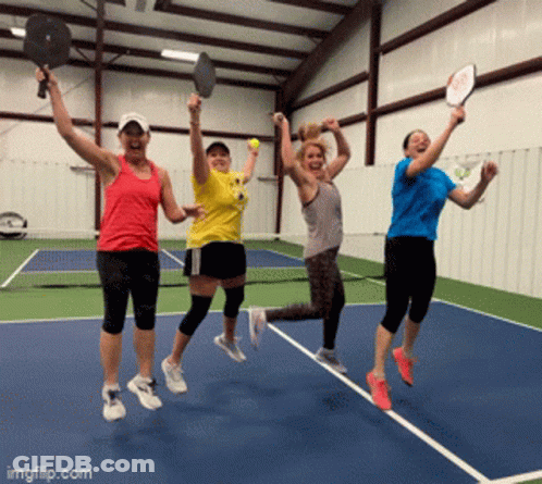 Women Jumping With Tennis Rackets GIF