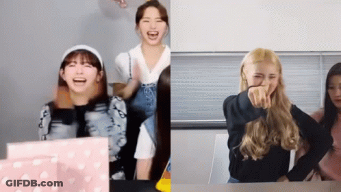 Women Laughing And Pointing At Table GIF