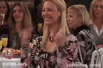 Women Laughing At Table GIF
