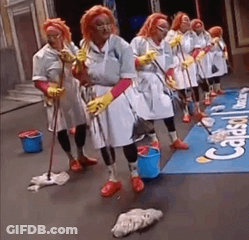 Women Mopping Floor In Front Of Calasi Sign GIF