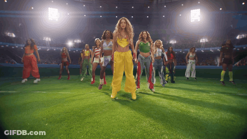 Women On Soccer Field One In Yellow Pants GIF