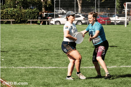 Women Playing Frisbee In Number 32 Shirt GIF