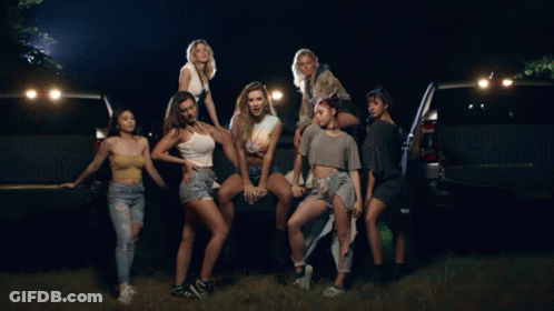 Women Posing On Back Of Pickup Truck GIF