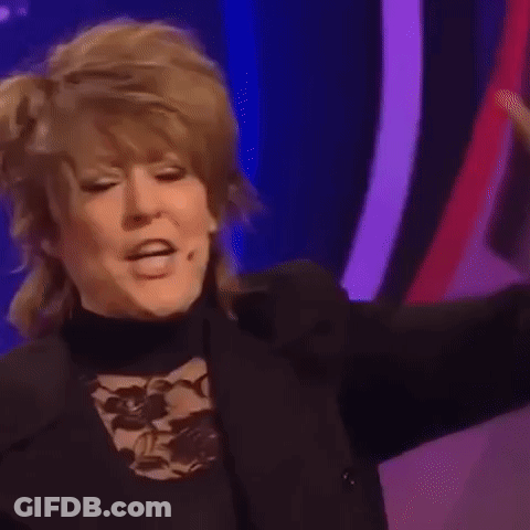Women Singing Into Microphones GIF