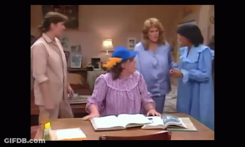Women Sitting At Table Talking GIF