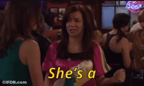 Women Sitting At Table With Arms Up Saying Woooooo GIF