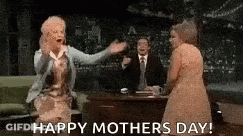 Women Sitting At Table With Man In Suit GIF