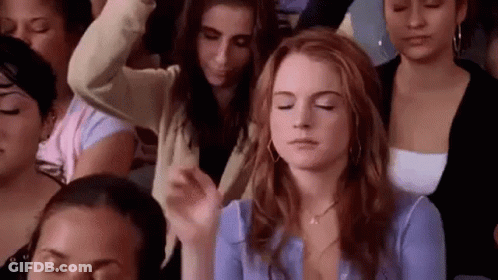 Women Sitting In A Row Eyes Closed GIF