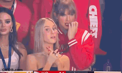 Women Sitting In Stadium Watching Game GIF