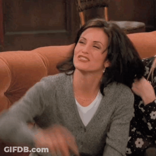 Women Sitting On Couch GIF