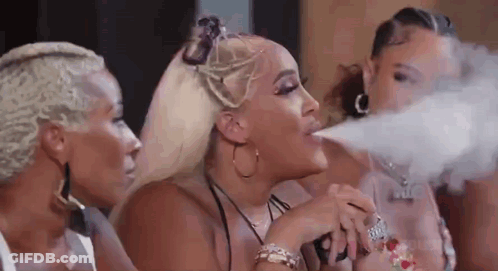 Women Smoking Electronic Cigarettes GIF