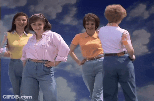 Women Standing In Front Of Blue Sky With Clouds GIF