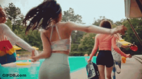 Women Standing In Front Of Pool GIF