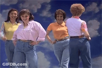 Women Standing Under Cloudy Sky GIF