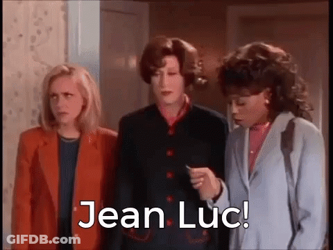 Women Standing With Jean Luc GIF