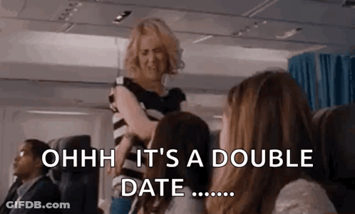 Women Talking On Airplane GIF