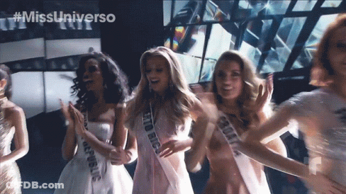 Women Wearing Sashes Saying Rio Big GIF