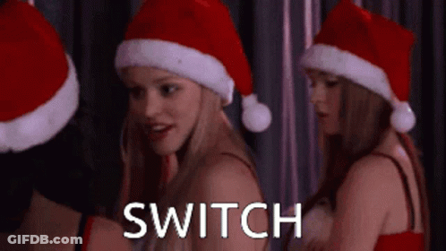 Women With Santa Hats Switch GIF
