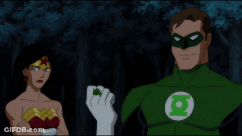 Wonder Woman And Green Lantern Looking At A Green Glowing Hand GIF