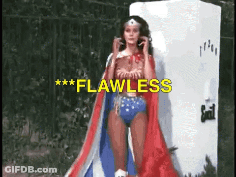 Wonder Woman Costume Standing In Front Of Refrigerator Flawless GIF