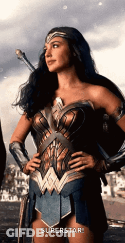 Wonder Woman Hands On Hips Holding Sword GIF