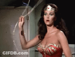 Wonder Woman Is Holding A Rope In Her Hand . GIF