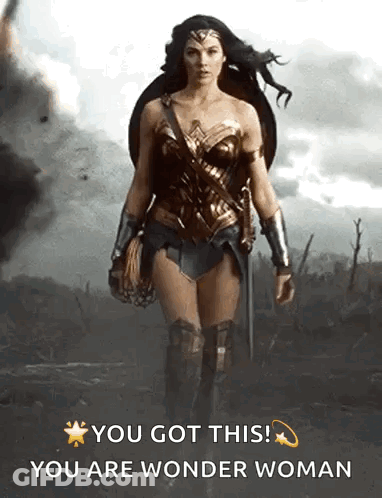 Wonder Woman Walking Through Field With Shield And Sword GIF
