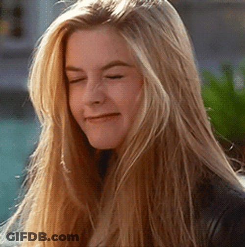 Wondering Alicia Silverstone Wink GIF