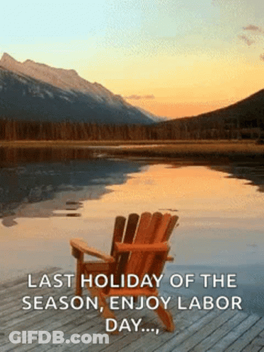 Wooden Chair On Dock Next To Lake GIF