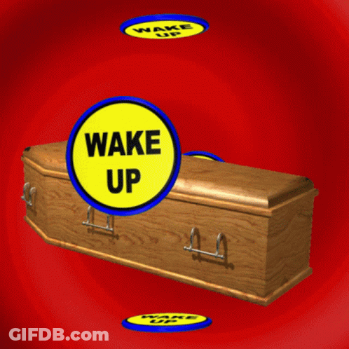 Wooden Coffin With Wake Up Sign GIF