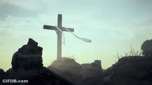 Wooden Cross On Rocky Hill GIF