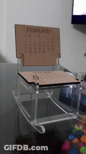 Wooden Rocking Chair With February Calendar GIF